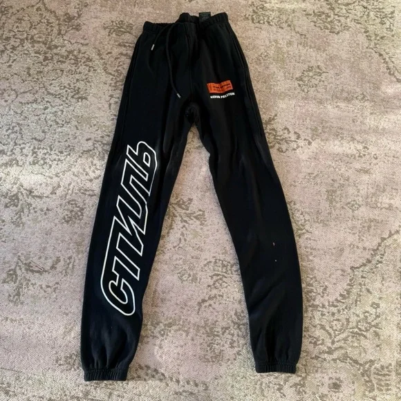Heron Preston Black Joggers with White and Orange Accents